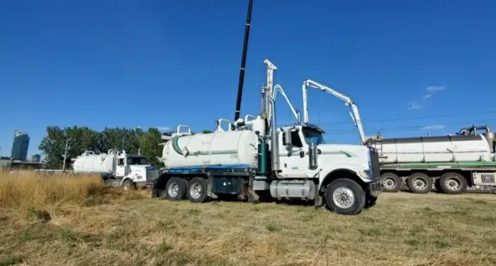 Vacuum truck servicing a construction site